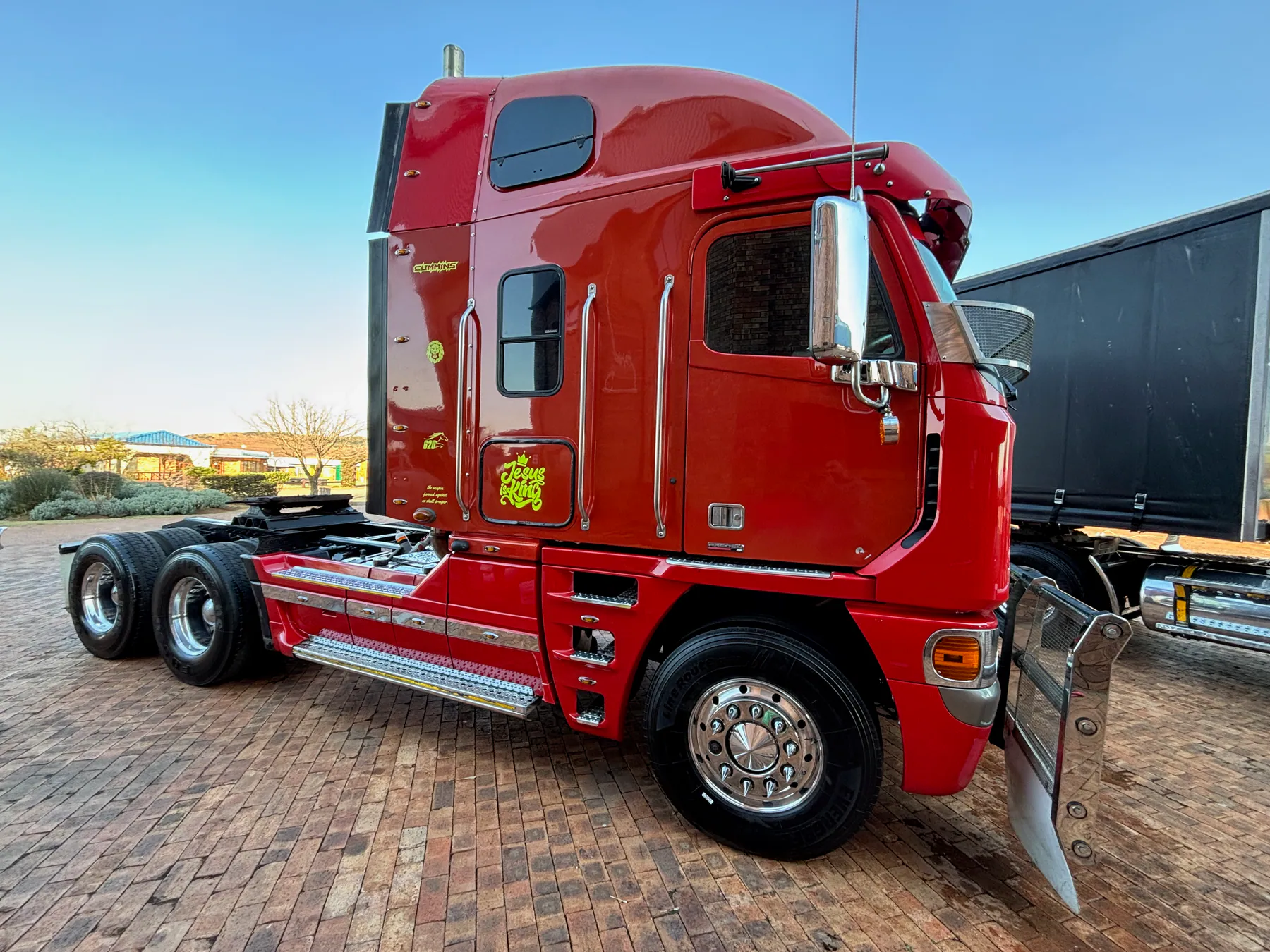 Custom red truck with a polished finish