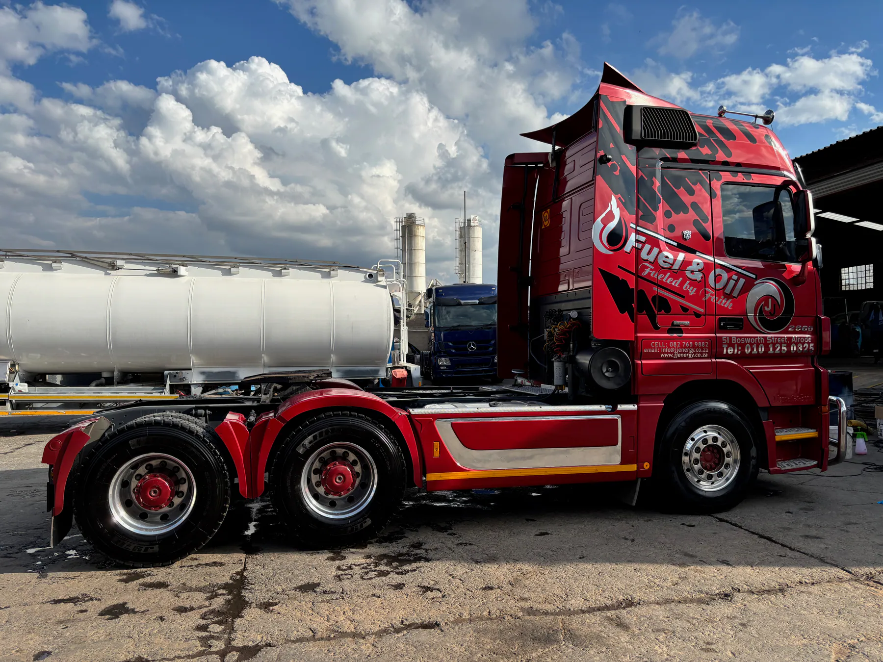 Red commercial truck after paint polishing