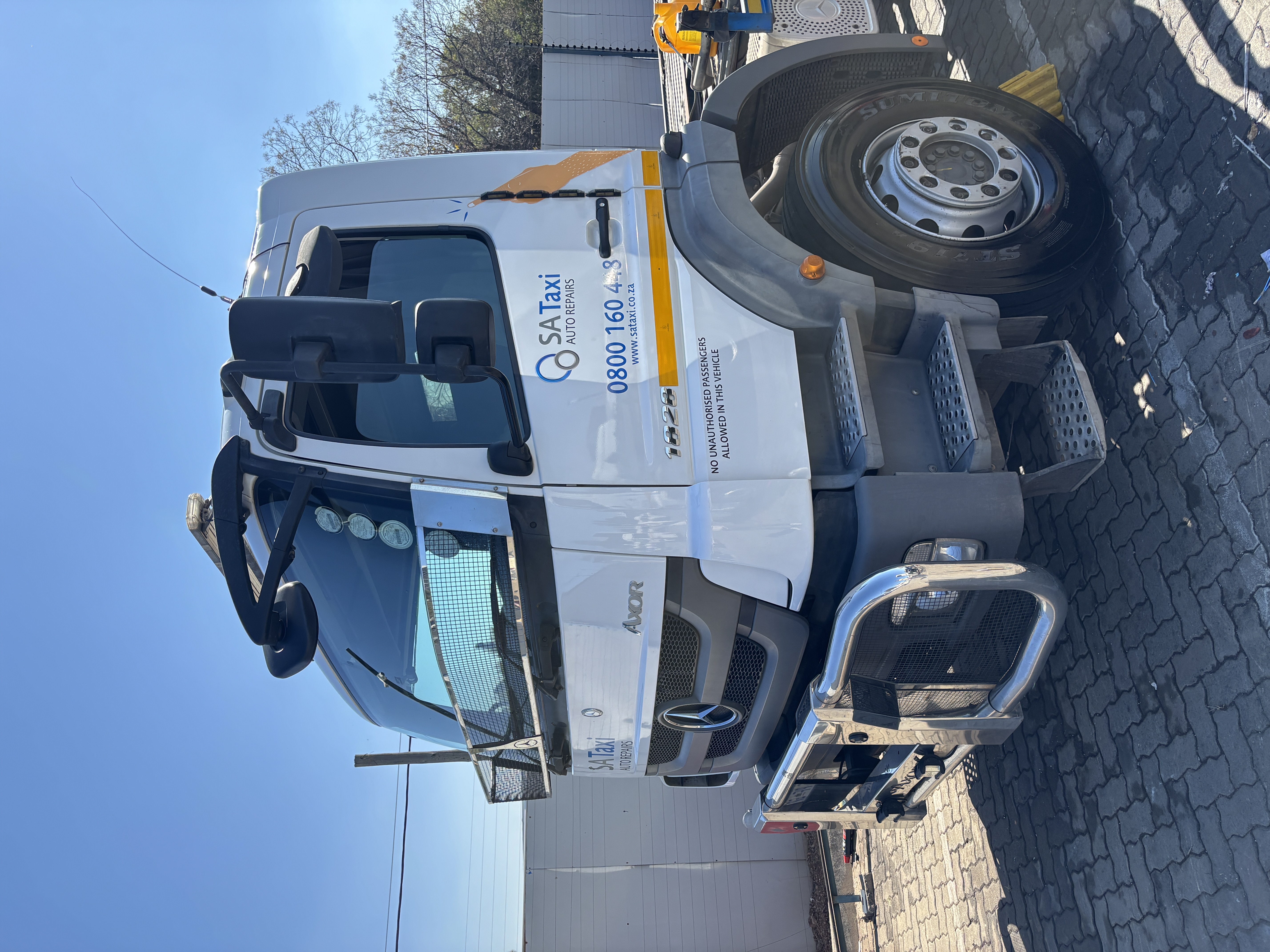 SA Taxi Mercedes Axor side profile after detailed commercial vehicle cleaning